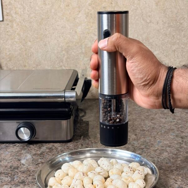 Automatic Electric Pepper Grinder by Konquer Times. Battery powered