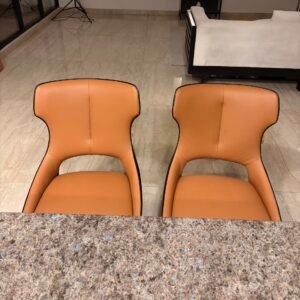 Dining chair set in Leather finish by Urban Ladder